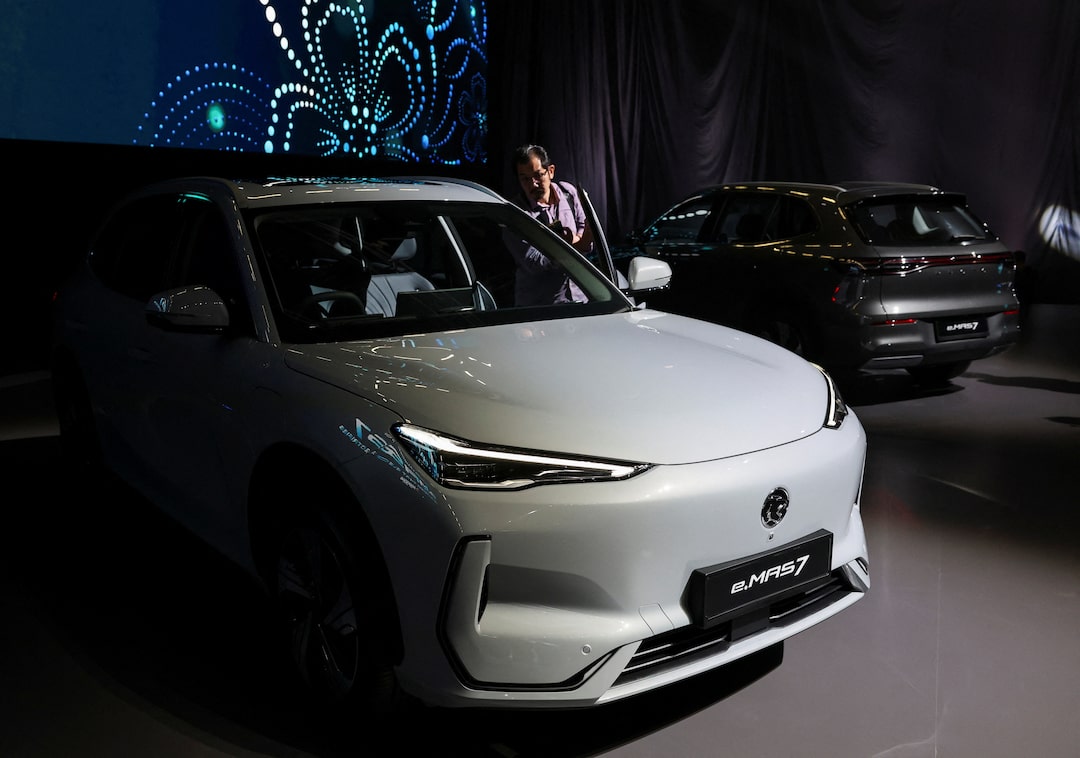 Malaysian autos firm Proton launches its first electric vehicle, e.MAS 7 at Kuala Lumpur